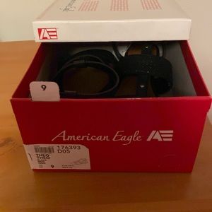Pair of American Eagle sandals black with a little silver